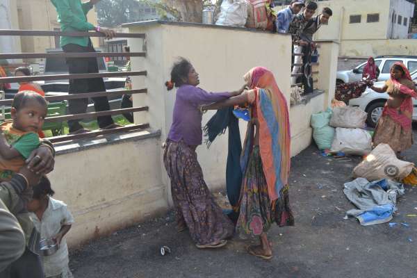 Two women fight for garbage