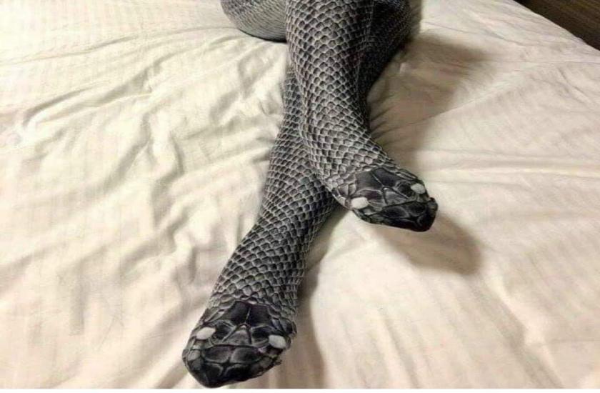 woman wore a pair of snake print stockings 