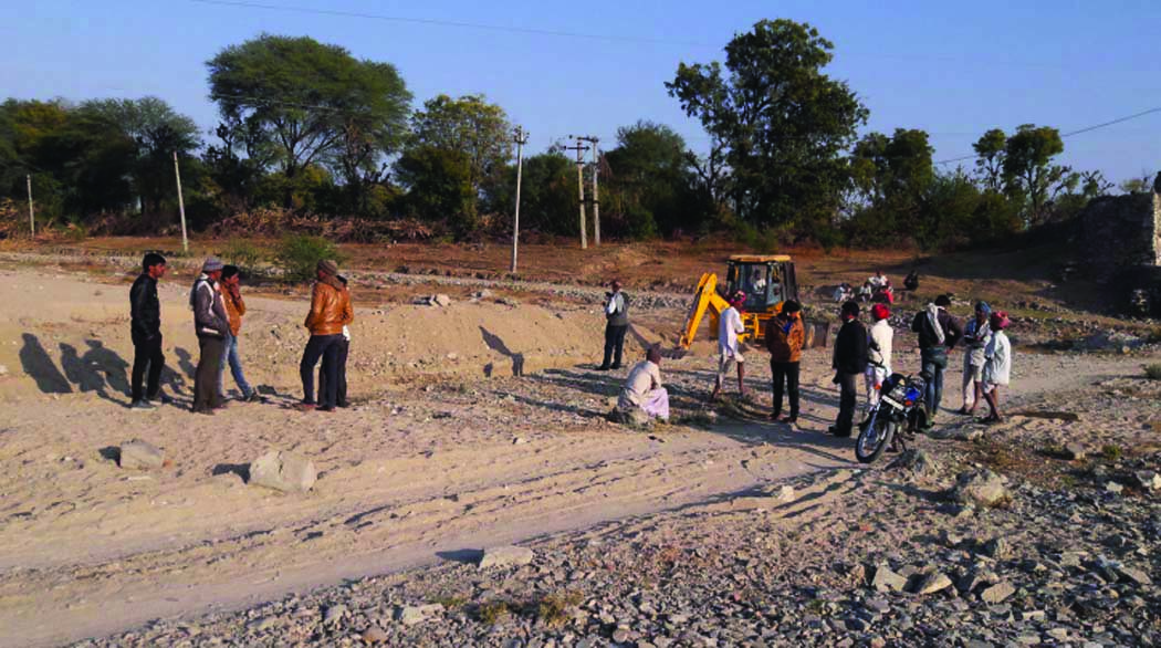 Young people stop gravel transportation