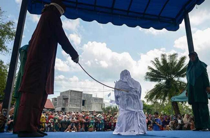 Indonesia couple beaten whipped 17 times for hugging in public
