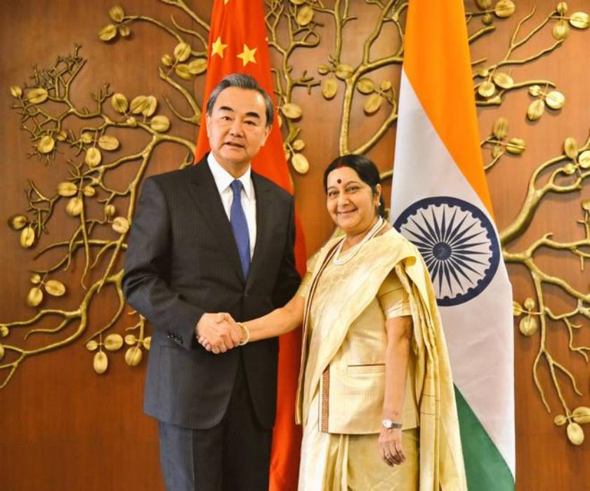sushma swaraj meets with her chineses and russina couterparts