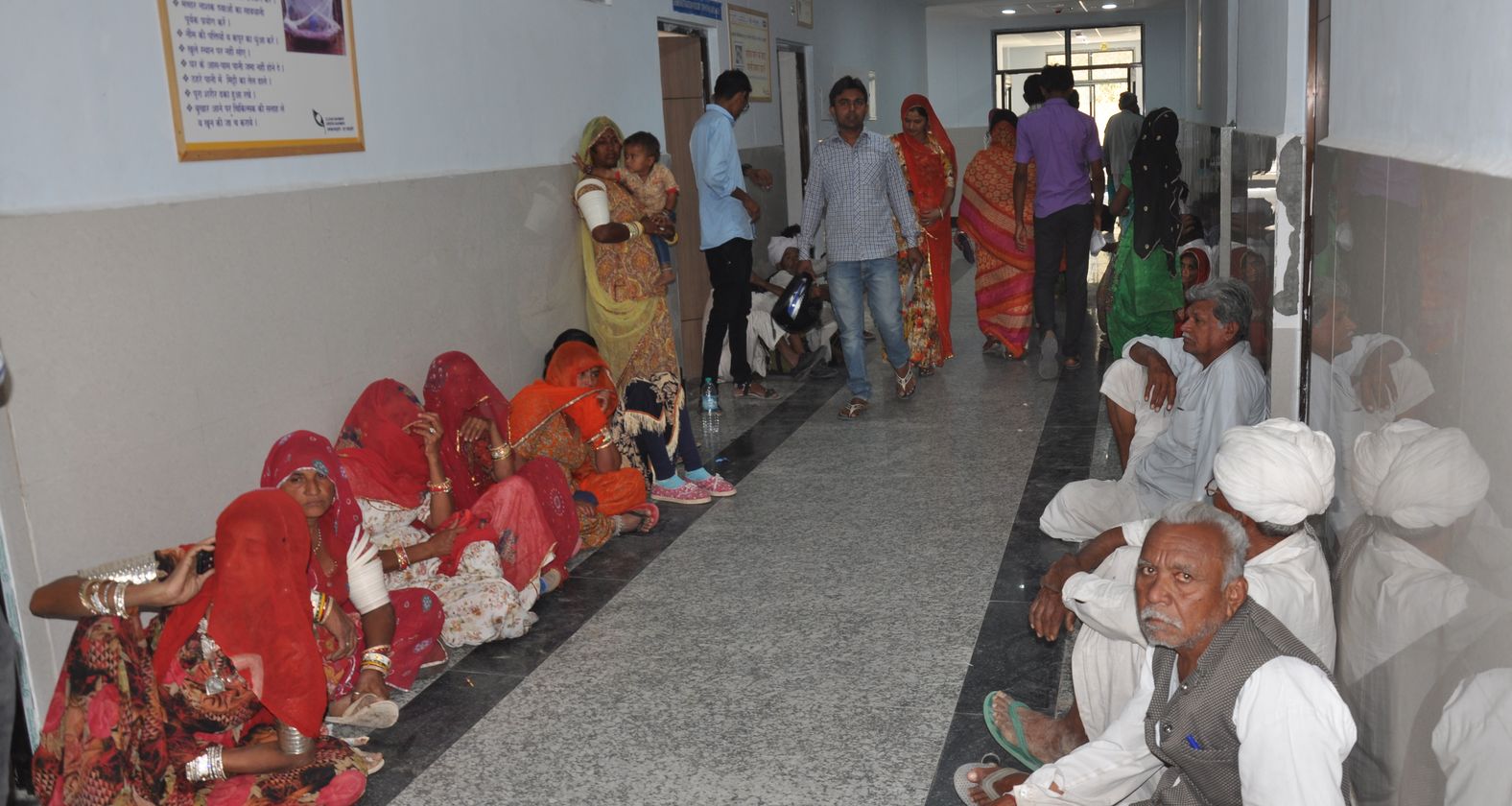 Patients queue in hospital