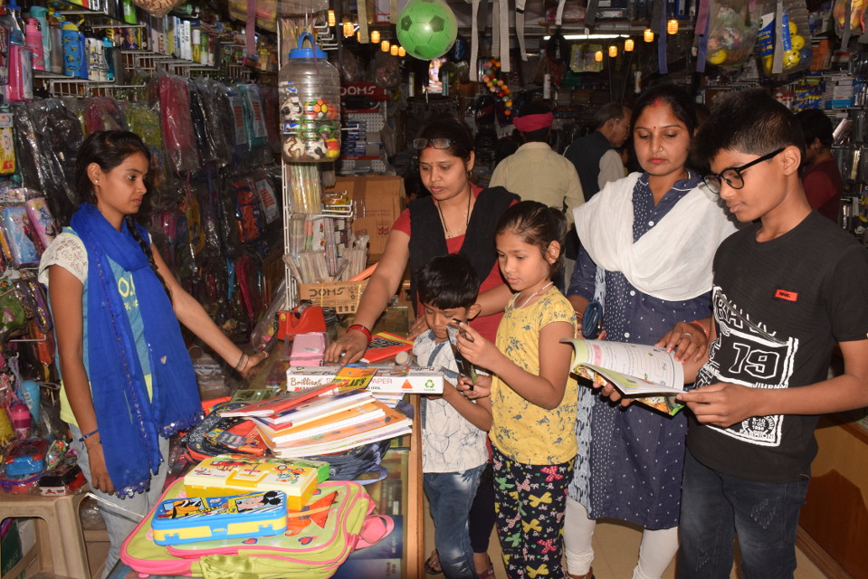 Kids likes new books, new clothes and bags