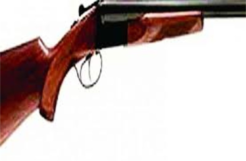 One held with 315 bore native rifle and live cartridge