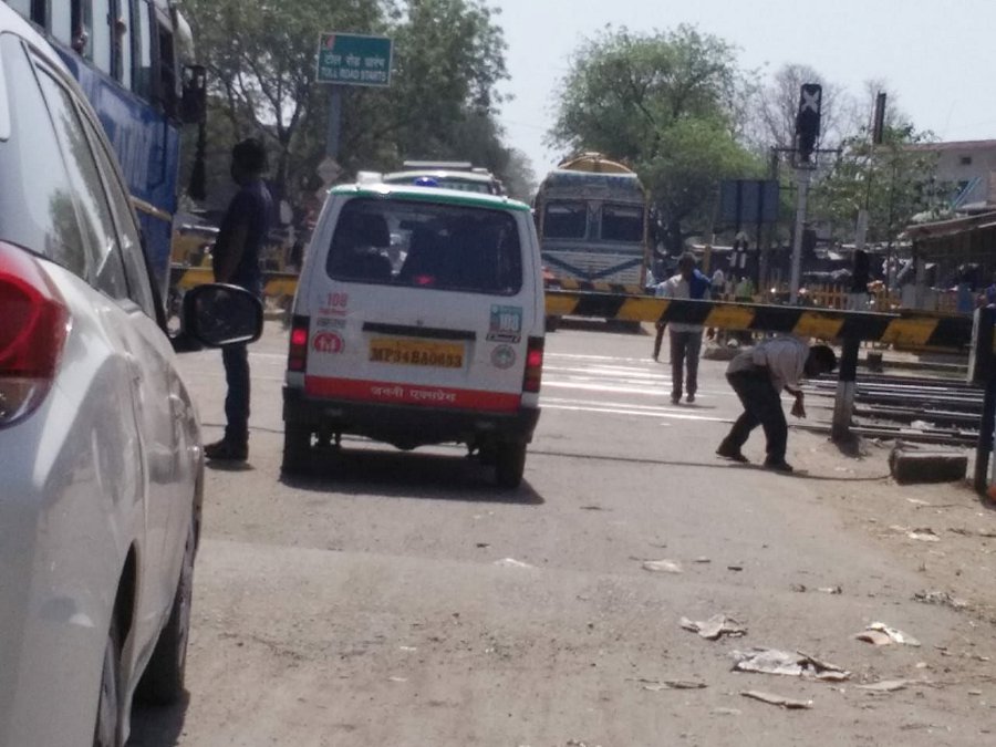 Ambulance trapped on Barghana railway crossing, moaning woman