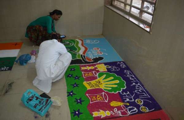 Essay, rangoli and painting competition