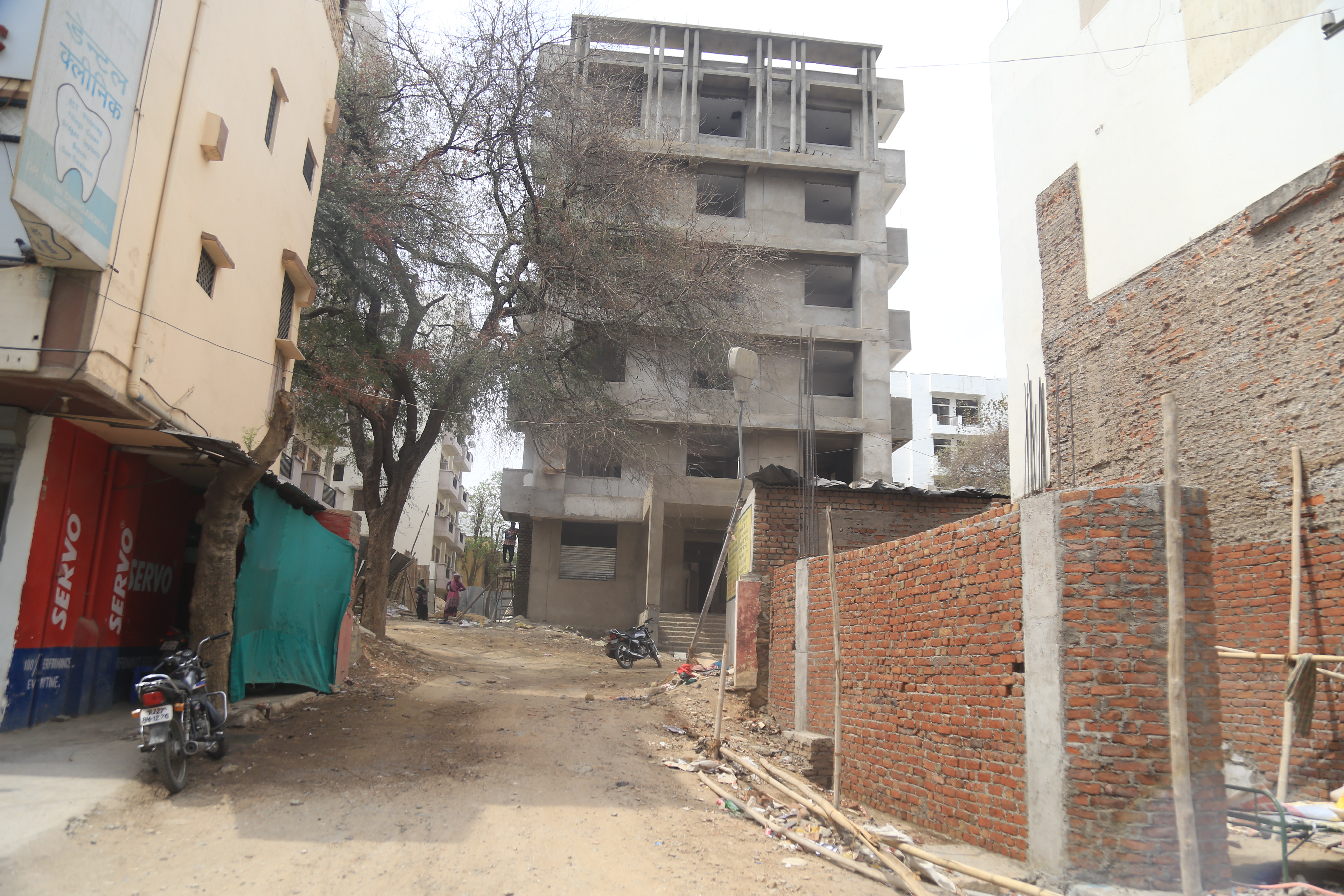 Encroachment by making wall on the entrance of the hostel