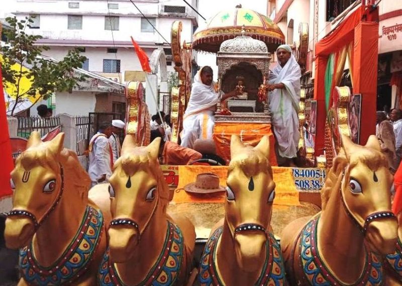 Shreeji, riding on a golden horse chariot