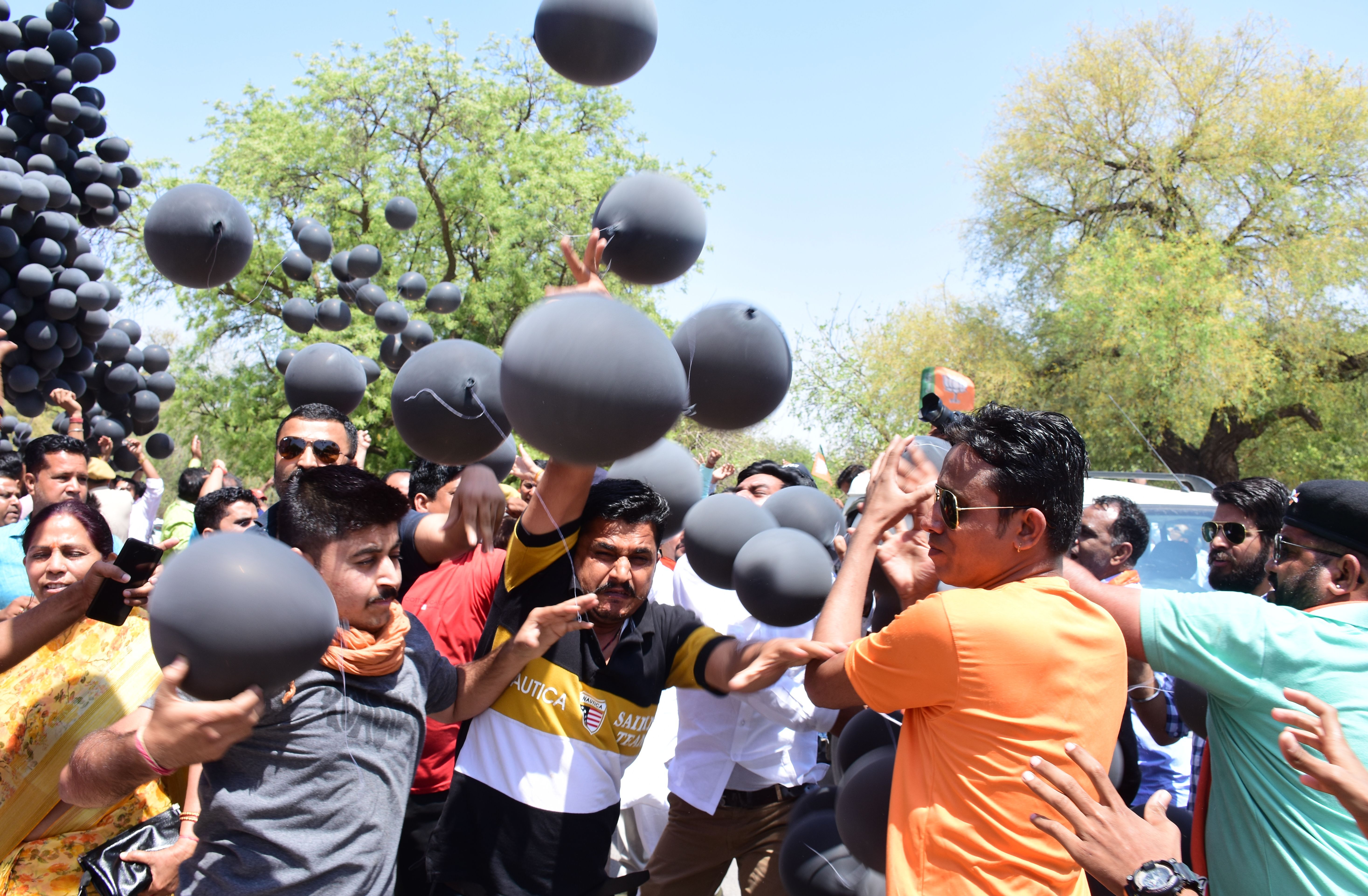 Black balloons flying in front of the Collectorate, wandering black fl