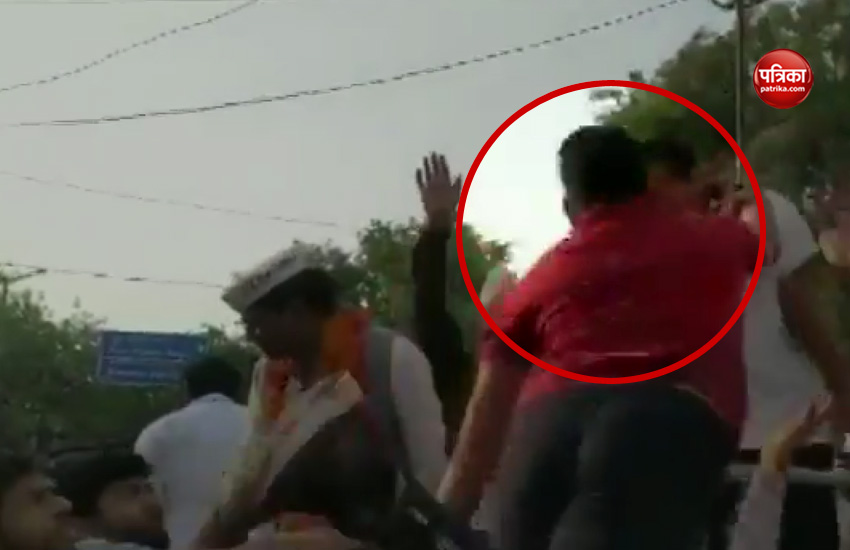 A man slapping Arvind Kejriwal