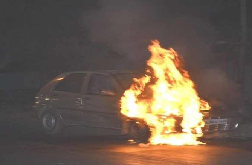 the burning car on highway