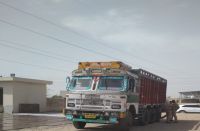 Four people sitting in the truck