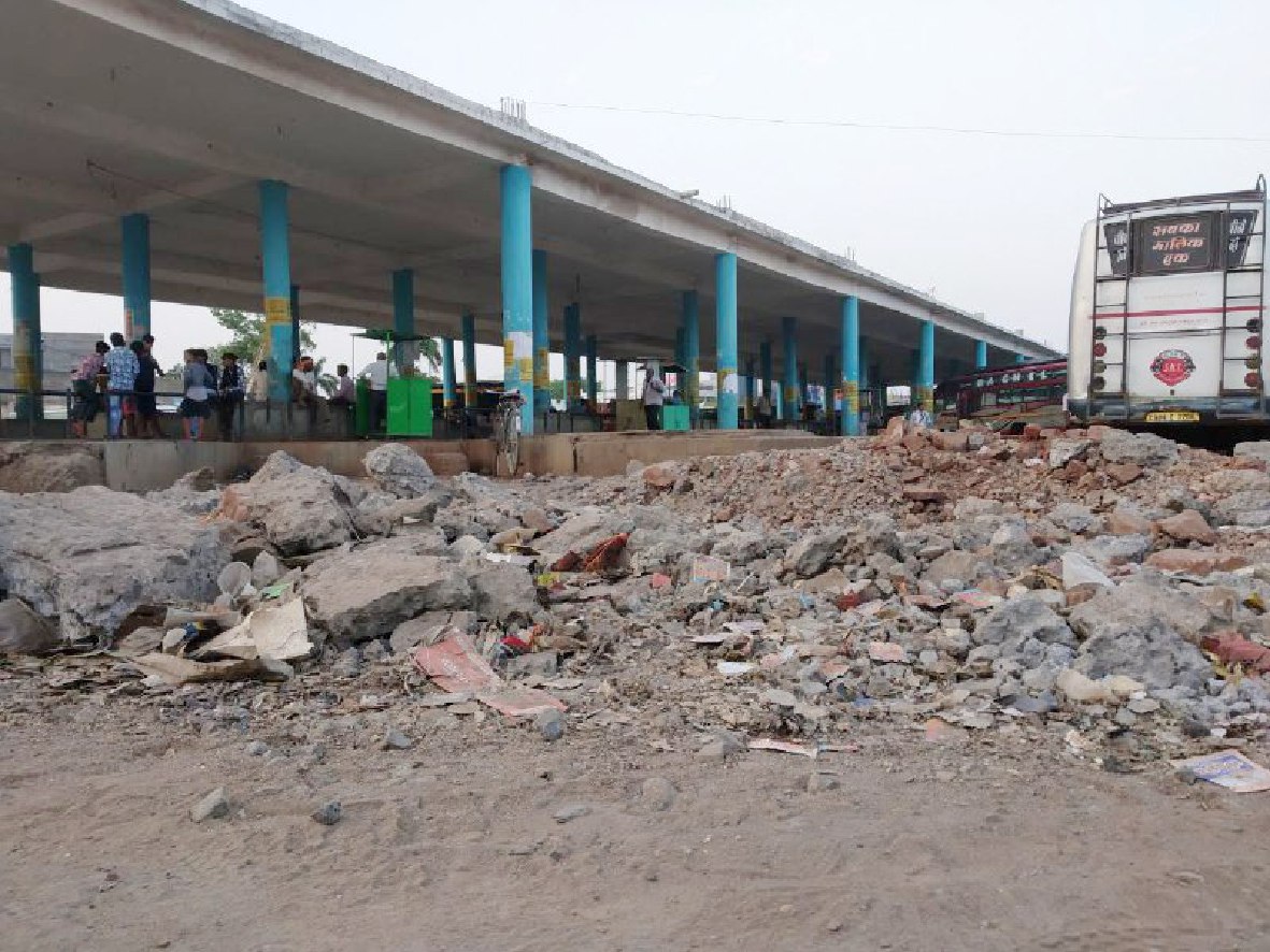 Stack of debris engaged in bus stand