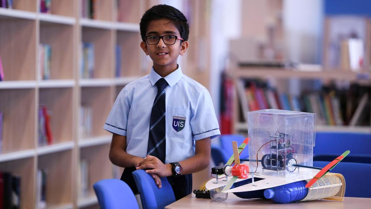 Sainath Manikandan with his plastic-eating robot invention