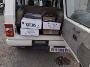 A jeep filled with the help of villagers
