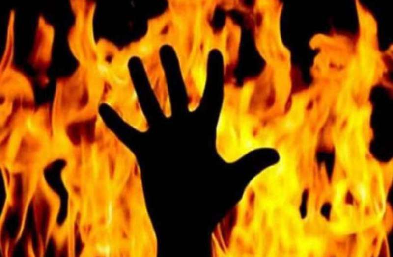 Woman home guard burnt alive on road in Property dispute