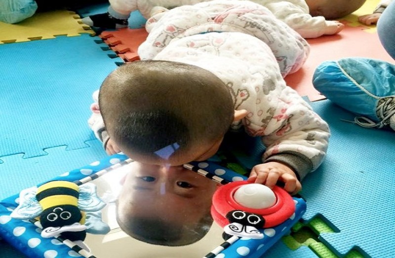 china women kidnaps baby to ward off bad luck returns him 26 Years