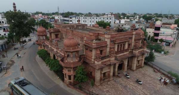 See the historic city Jubilee Hall made of red and white stones 