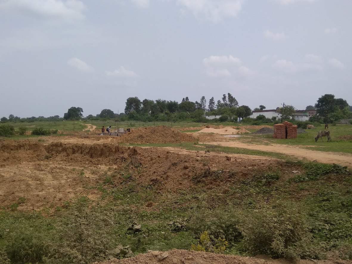 Pucca wall acquired land of district hospital without permission