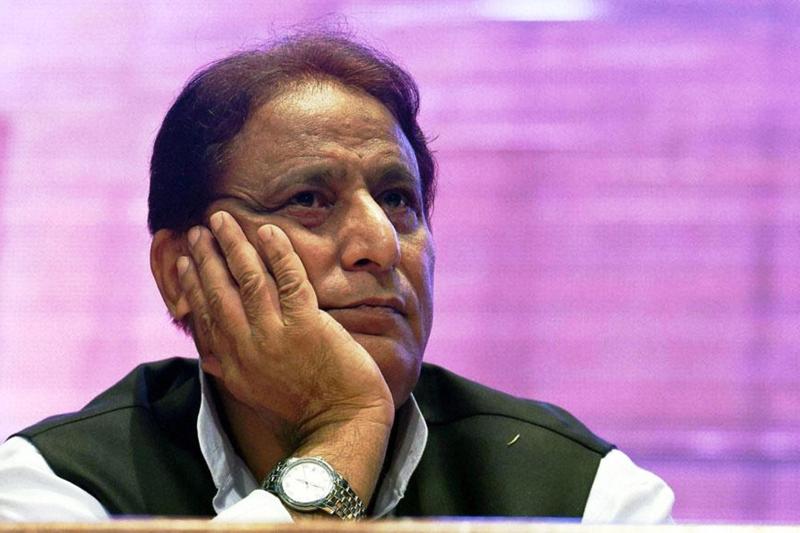 women blow azam khan's effigy and demand from lok sabha speaker