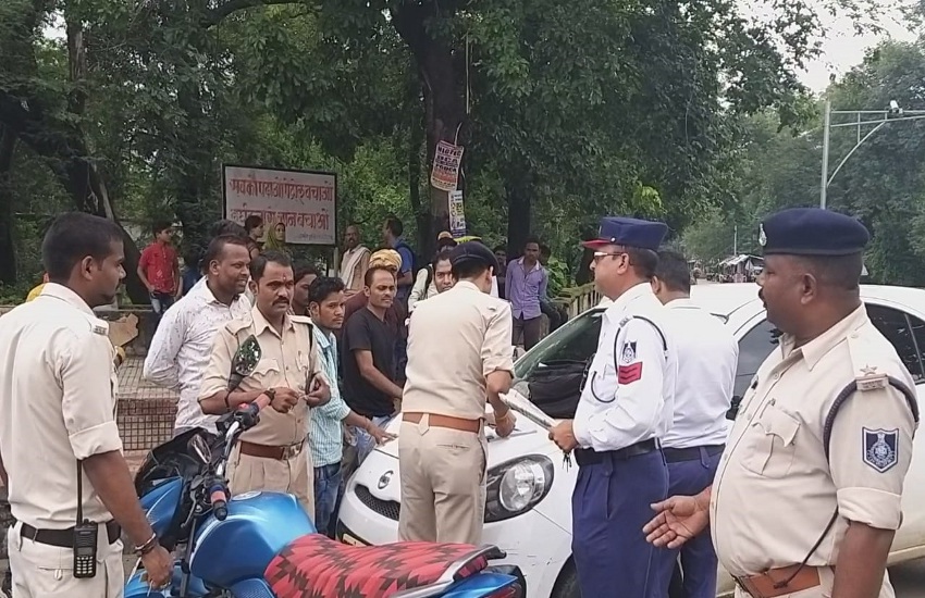 police action to Bike driver not wearing a helmet