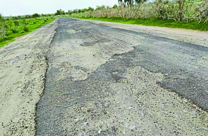 Uprooted road, pit and kankar trouble