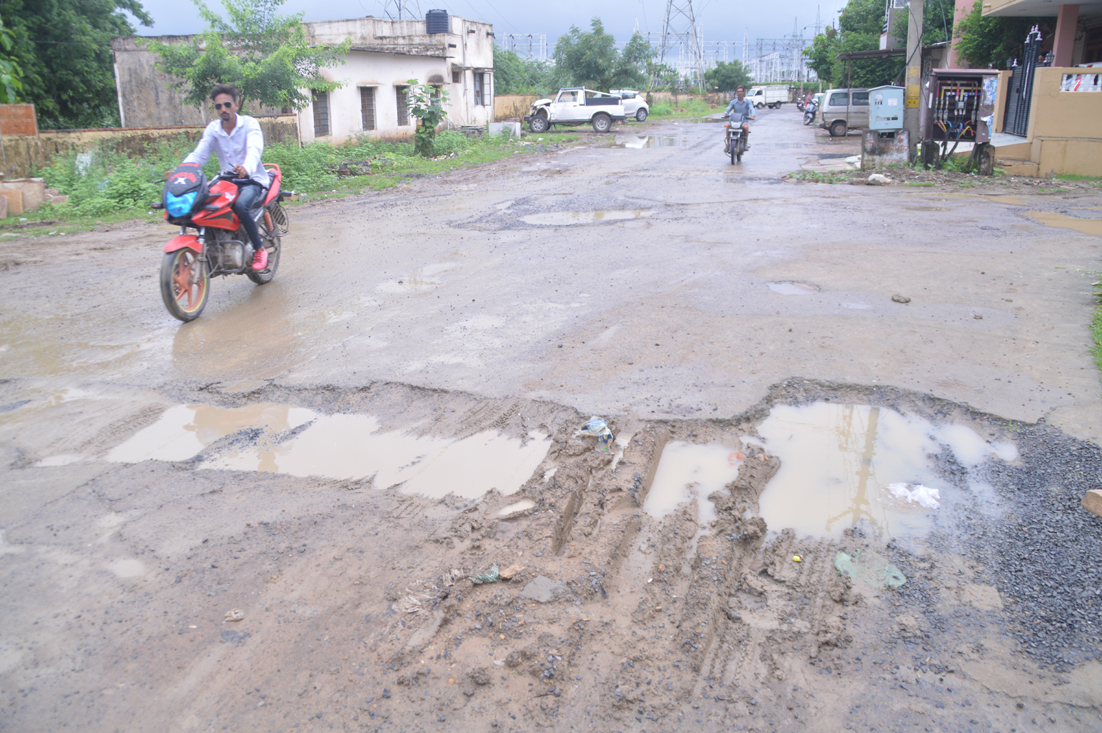 The rains spoiled the road, making it difficult to walk on the damaged