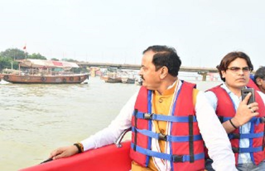 Deputy C M Keshav Maurya got out boat to meet flood victims