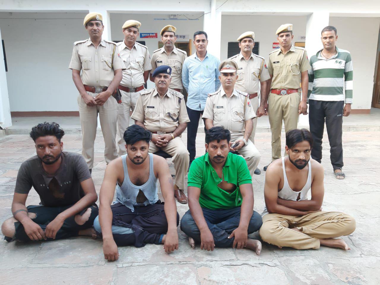 Three other arrested including gangster