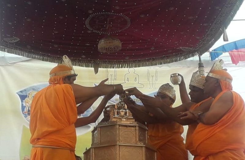 Panchamrit Abhishek on Jinendra statue