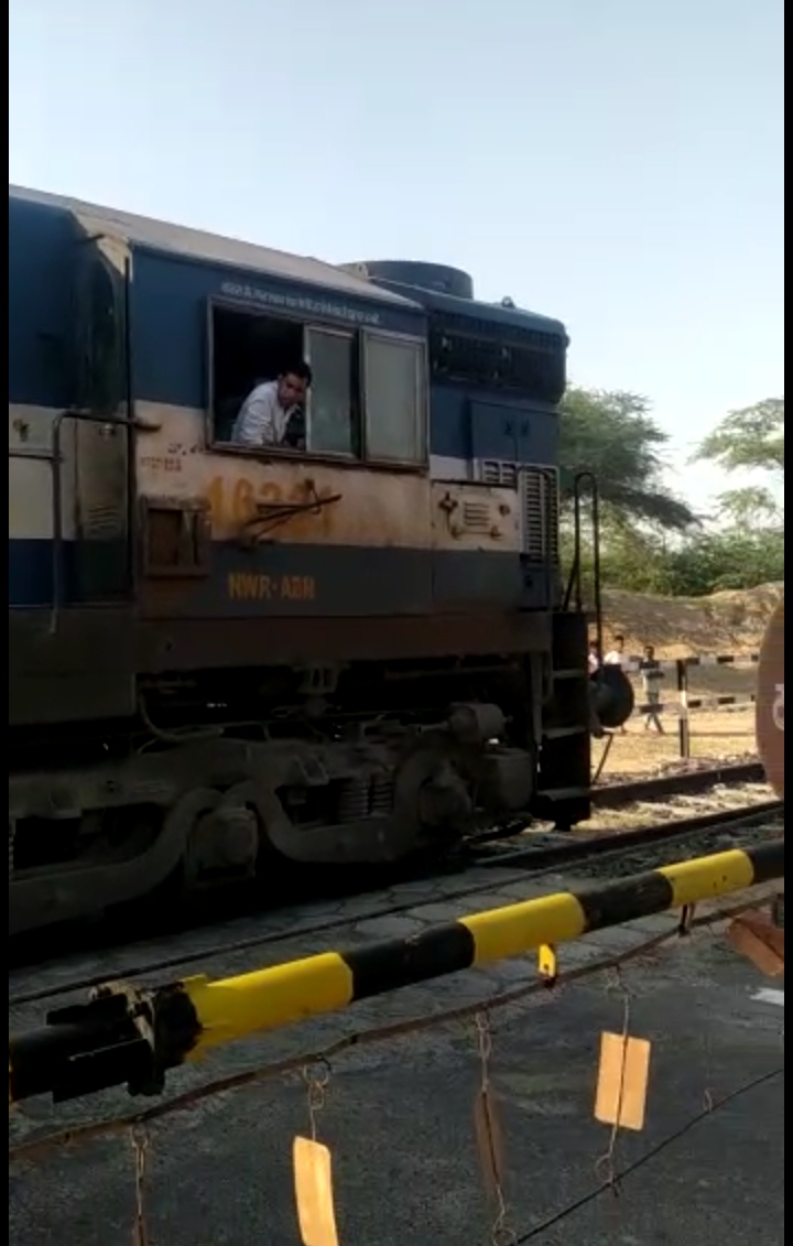 Train reached, gate was open, loco pilot stopped car