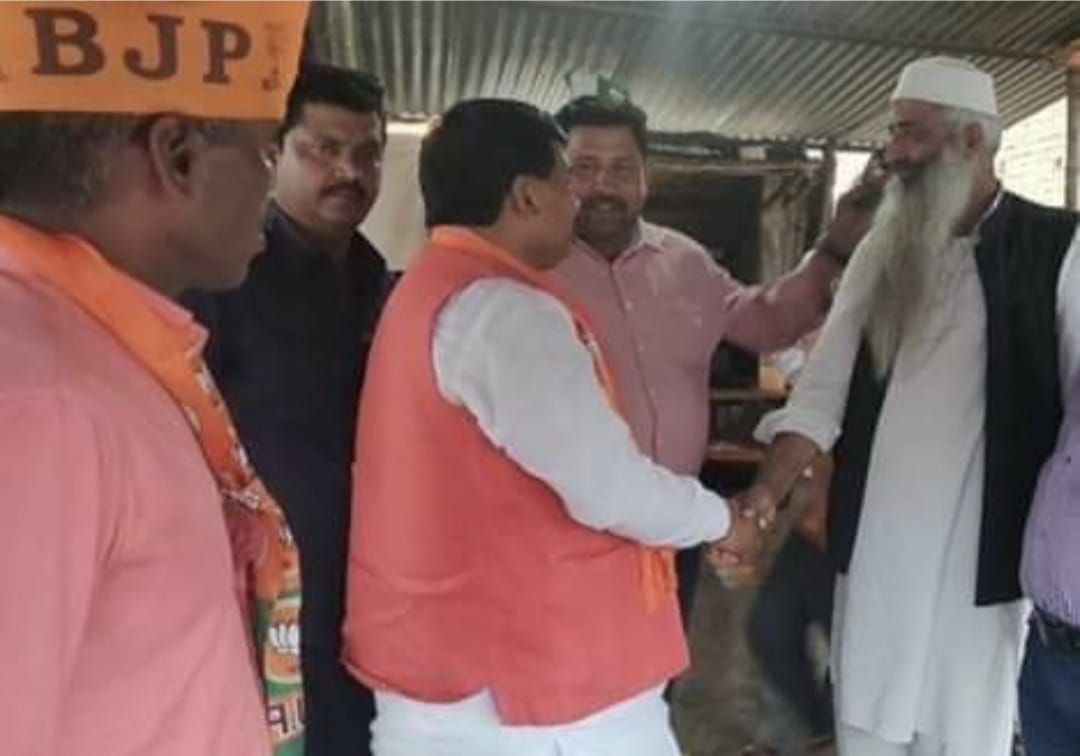 Bjp mp with aimim candidate 