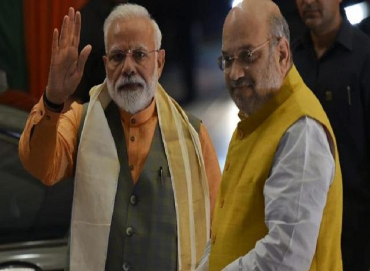 pm_modi_with_bjp_president_amit_shah_photo_vipin_kumar_ht_photo__1553490902.jpg