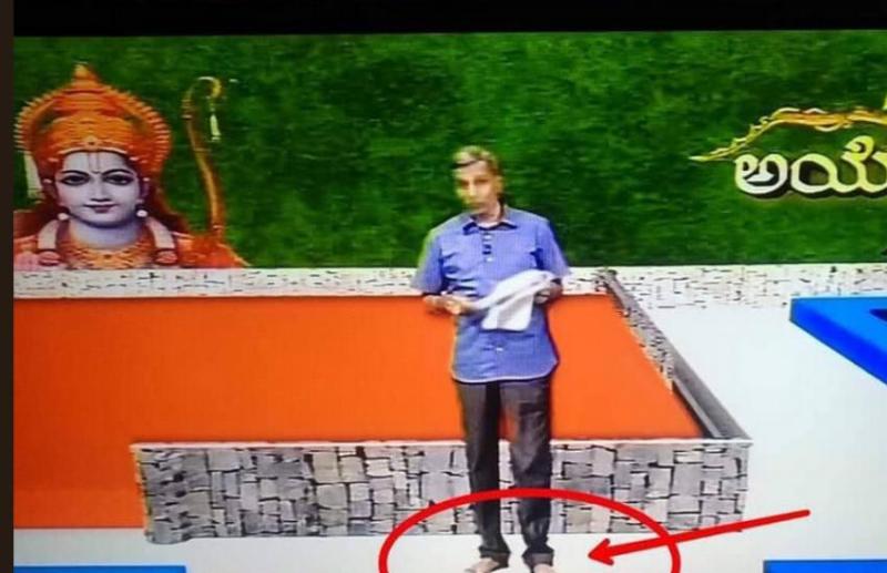 achor reading news barefooted