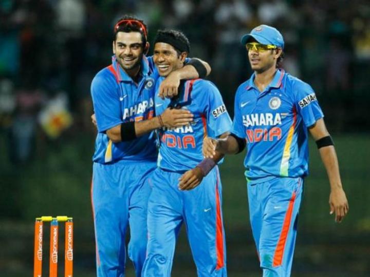 dinda_with_kohli.jpg