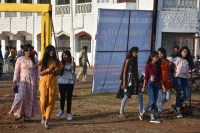 naudible garage built in front of leading college, spill jam behind