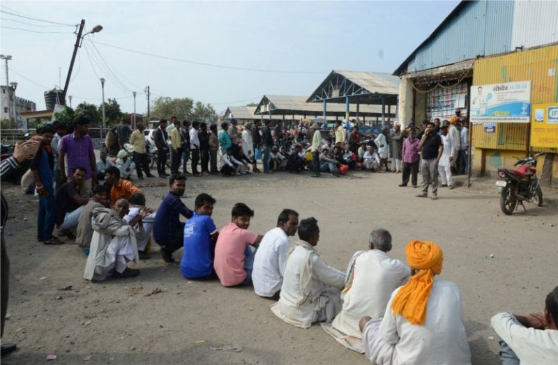 Farmers are not in the field but are queuing up