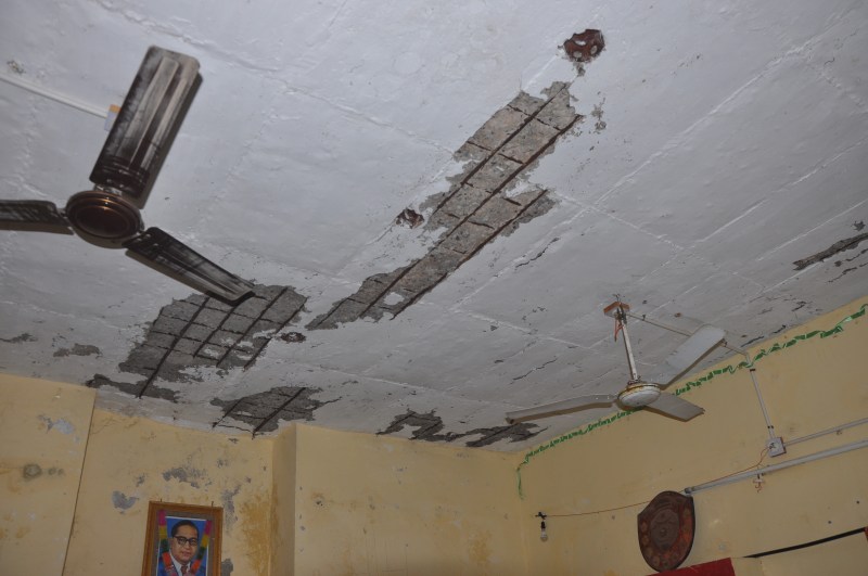 Future of 60 innocent under damaged roof, responsible unknown