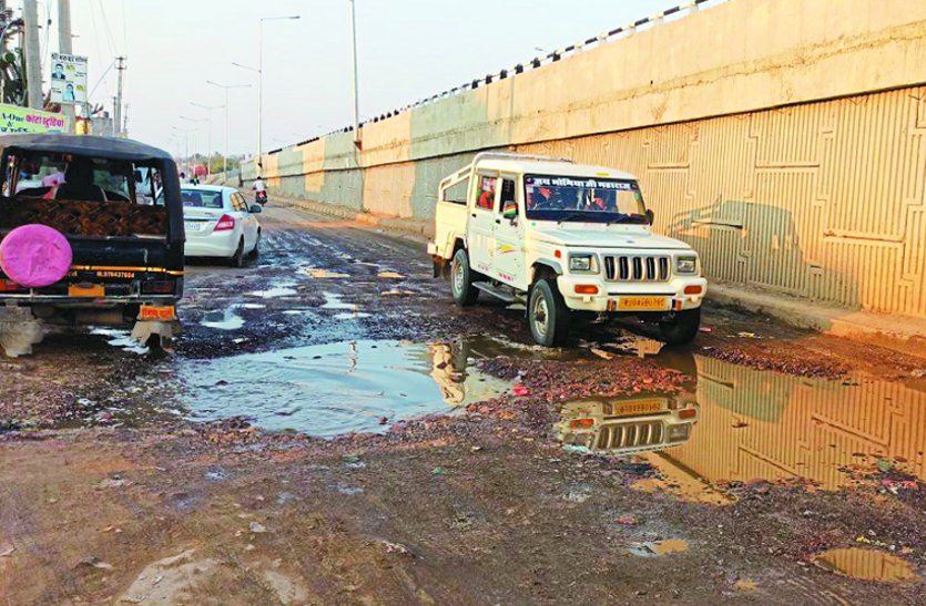 Road turning into pit, people upset dirt