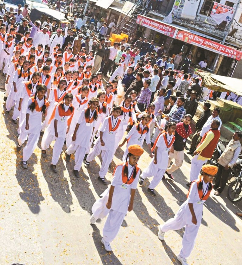 Villagers welcomed with flowers