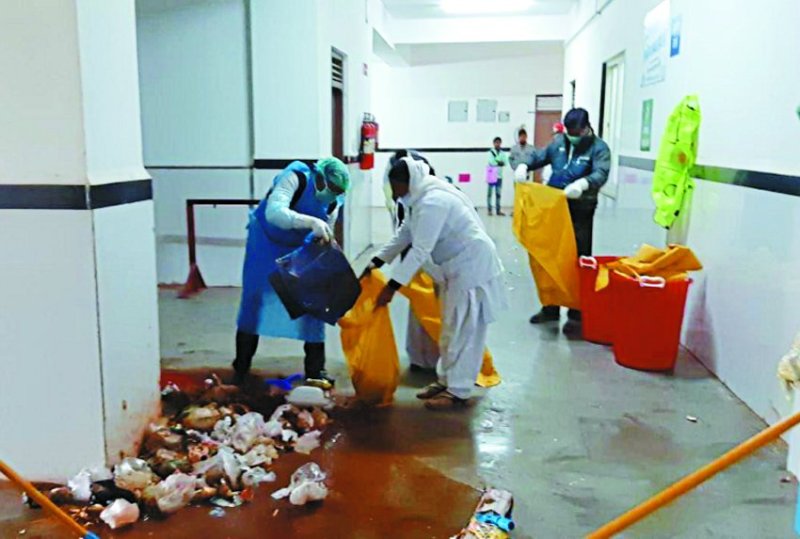 Hospital staff picked up a broom, a trolley took out the trash