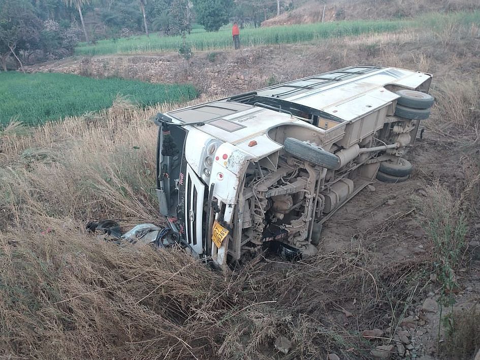 Bus overturned, driver injured