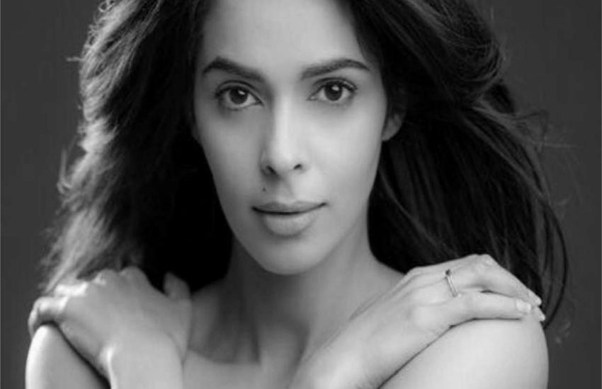 mallika sherawat shared her topless pictures