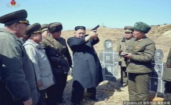 Kim Jong Un Holding Gun