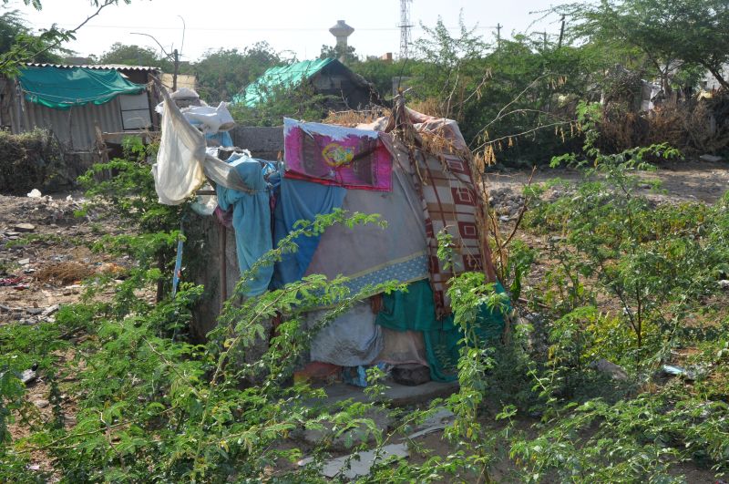 only open jail in the state where slums remain in slums