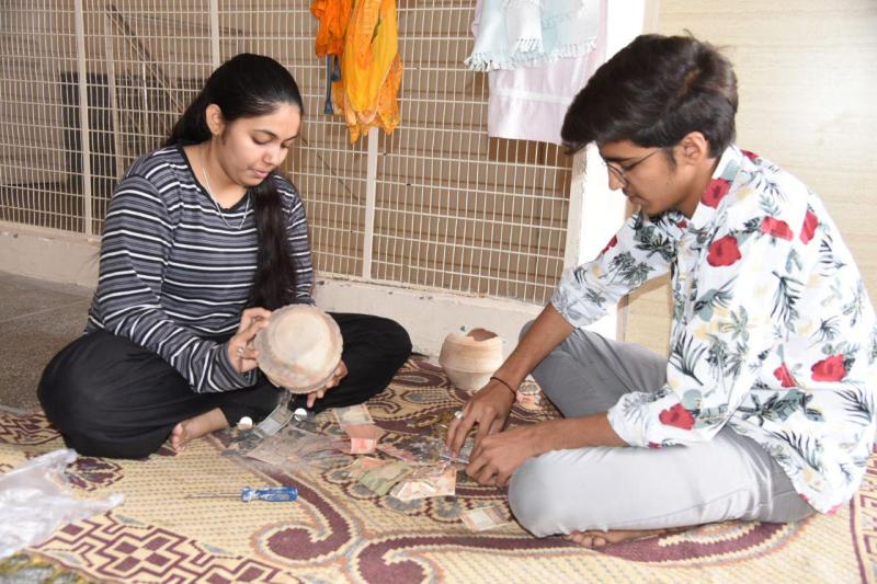 children are helping in donating funds for relief to needful people