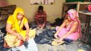 कुचामन में अपने घर में ही जूतियां बनाने के कार्य में जुटा परिवार।