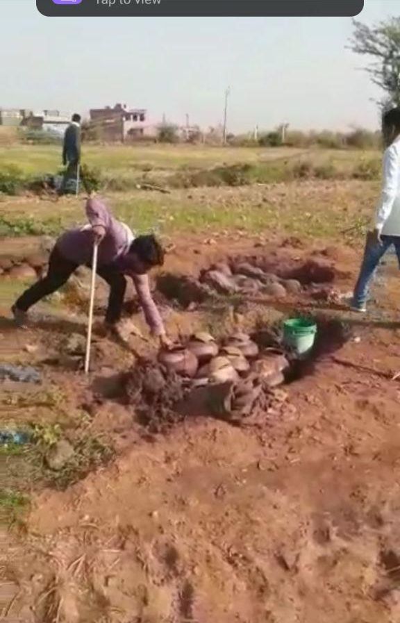 Illegal liquor business was going on by making pits in the fields