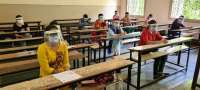 Exam in Corona times: फेस शील्ड, मास्क, सोशल डिस्टेंसिंग के साथ परीक्षा