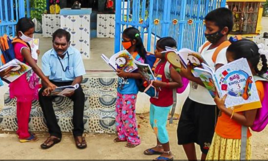 travelled over 100 km to distribute books and bags to his students